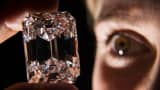 An employee holds the 100-Carat perfect diamond at Sotheby's auction house.